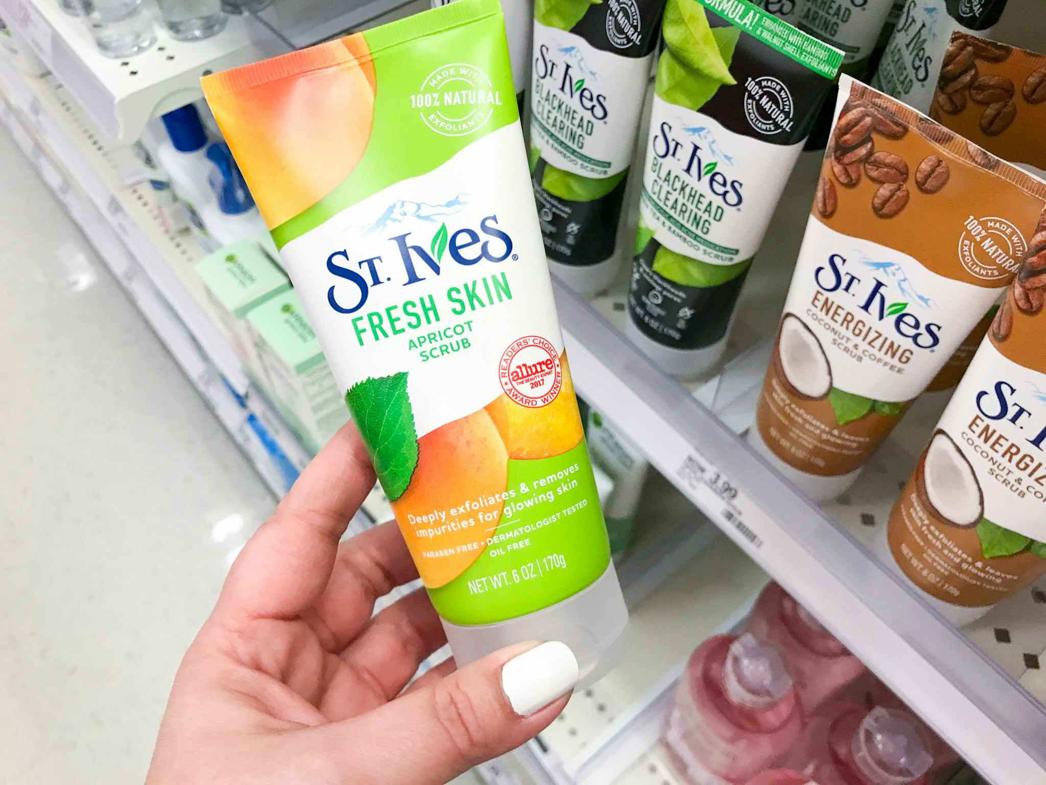 hand holding st. ives face scrub at target