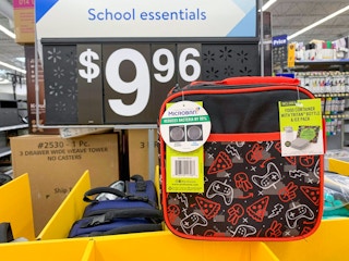 arctic zone lunchboxes on display with large price sign