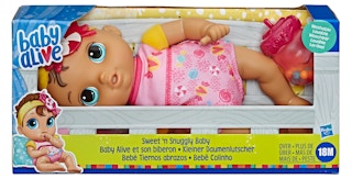 stock photo of baby alive sweet snuggle baby doll in box on white background