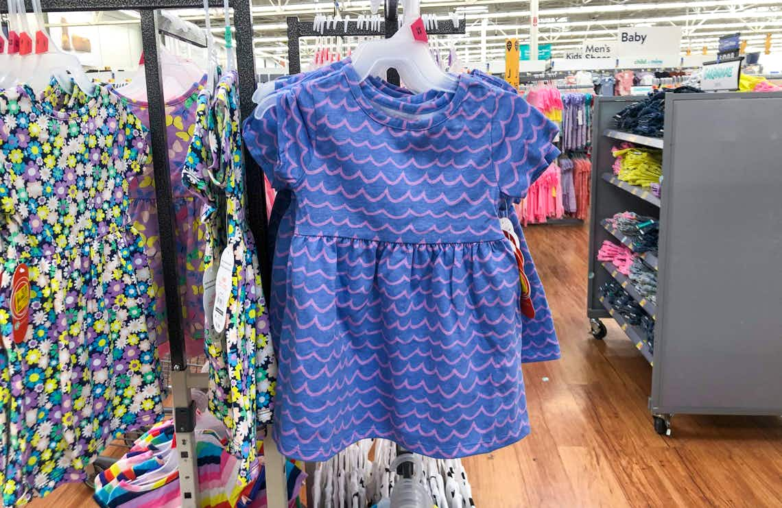 wonder nation baby dress hanging on rack