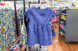 wonder nation baby dress hanging on rack