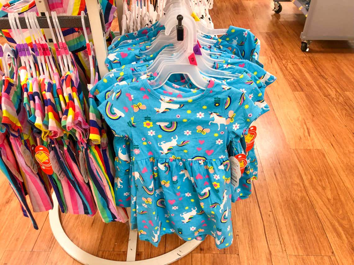 wonder nation baby dress hanging on rack