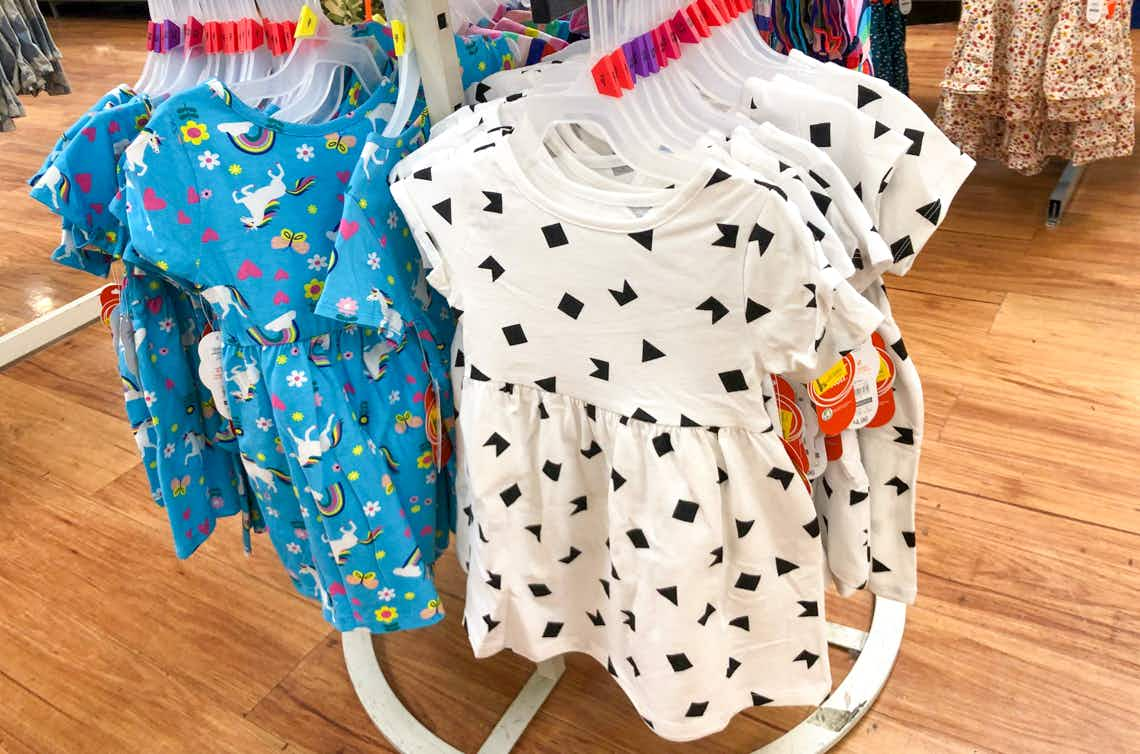 wonder nation baby dress hanging on rack 