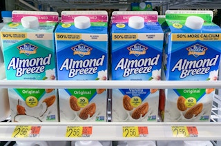 blue diamond almond breeze almondmilk on a shelf in walmart fridge