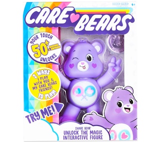 stock photo of care bear share bear interactive toy on white background