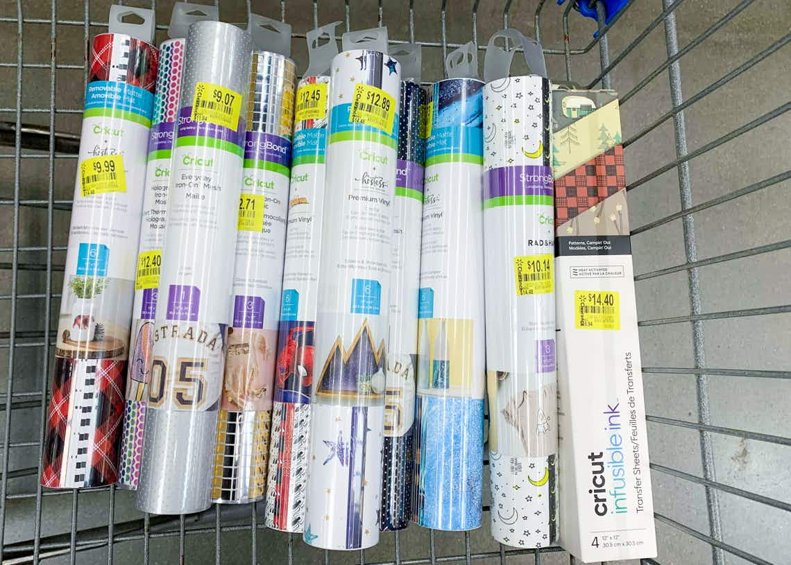 collection of cricut vinyl tubes in walmart cart