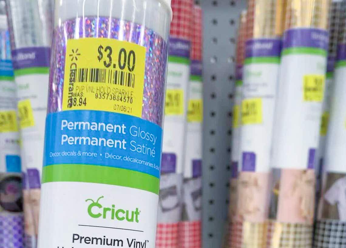close up of cricut vinyl clearance tag with other vinyl tubes in background
