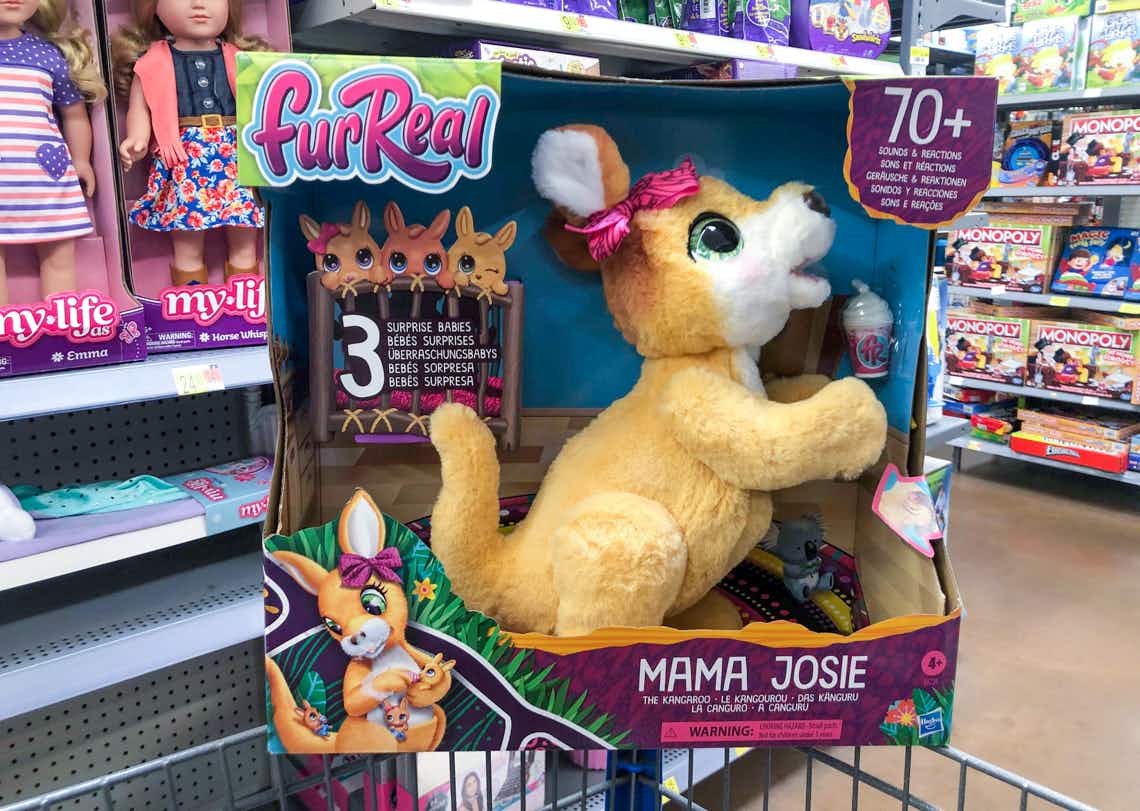 furReal mama josie and joeys toy perched on top of walmart cart in walmart toy section