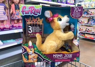 furReal mama josie and joeys toy perched on top of walmart cart in walmart toy section