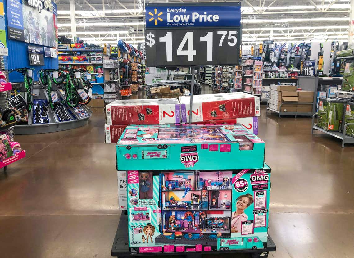 lol surprise omg real wood dollhouse with 85+ suprises in center of walmart aisle with large price sign