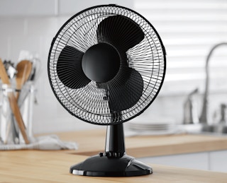 stock photo of mainstays table top fan staged in kitchen area