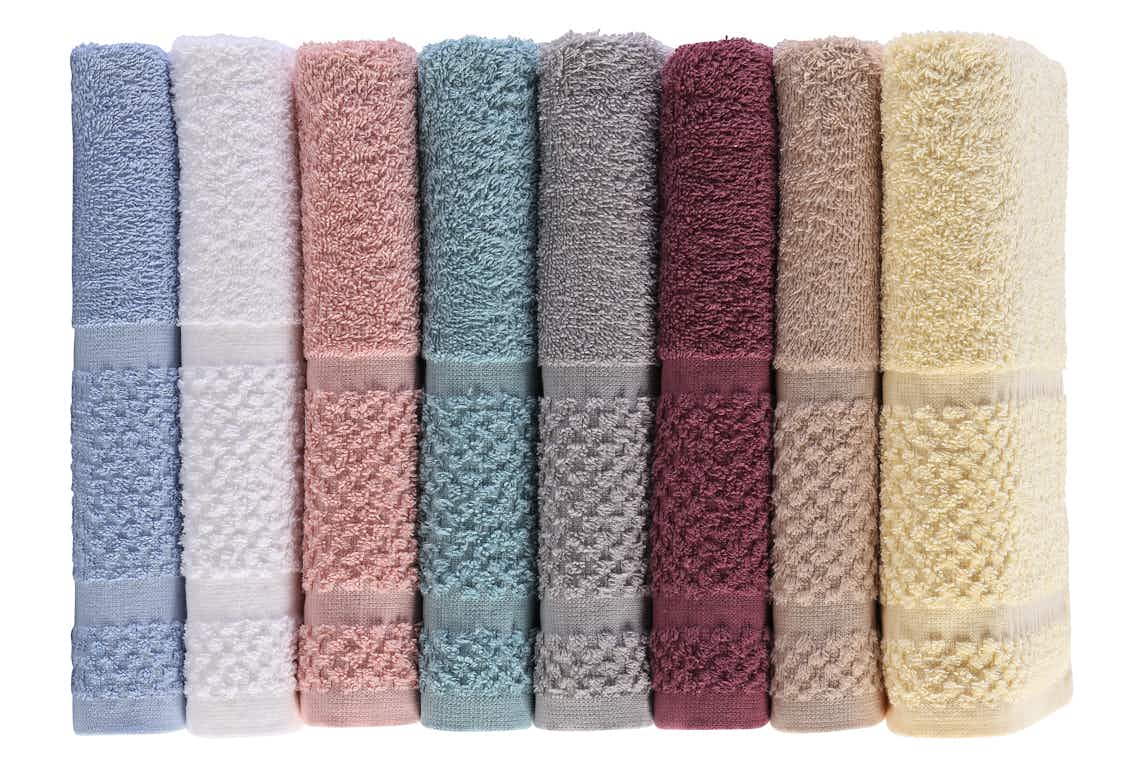 stock photo of mainstays bath towels in various colors on white background