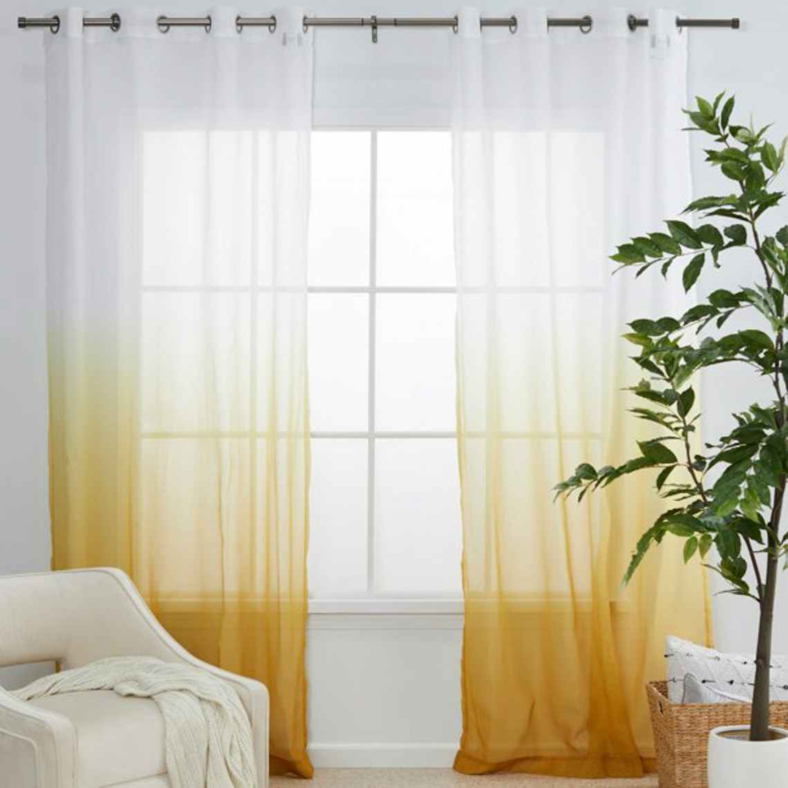 stock photo of modrn mid century ombre curtais staged in room