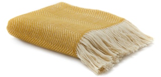 stock photo of modrn wool throw blanket on white background