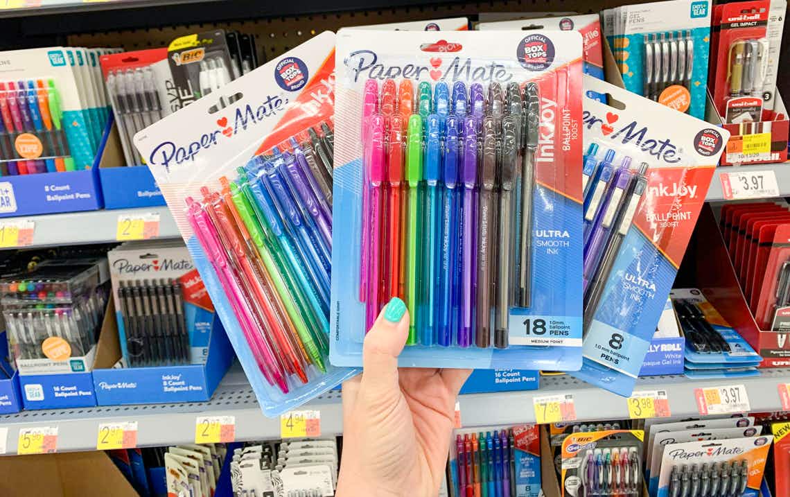 the packages of paper mate inkjoy pens held in front of other pens at walmart