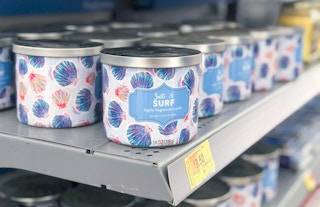 mainstays salt and surf soy candles on walmart shelf with clearance tags