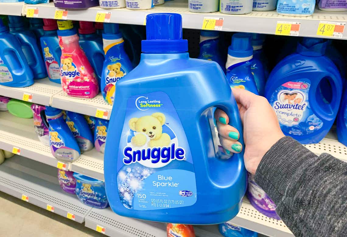 jug of snuggle fabric softener held in front of other snuggle products