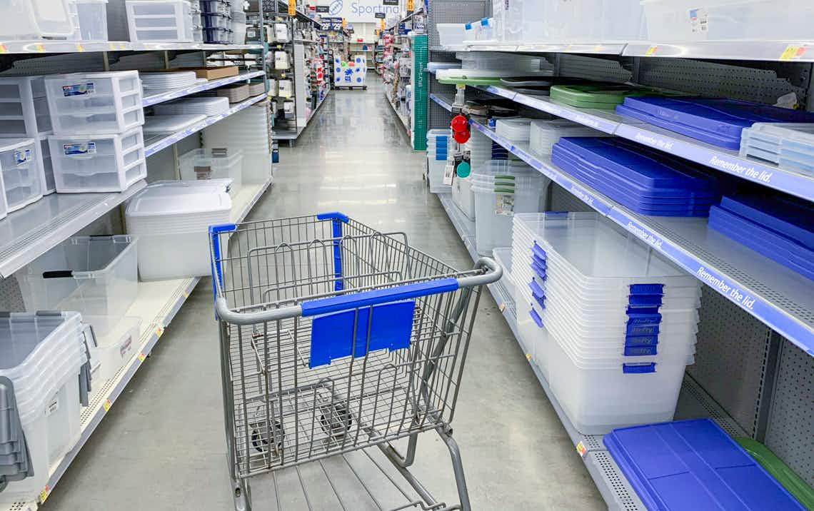 storage container aisle at walmart with car in middle of aisle
