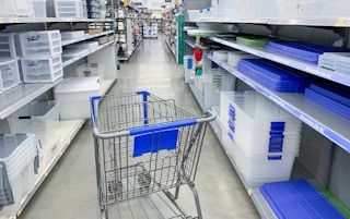 storage container aisle at walmart with car in middle of aisle