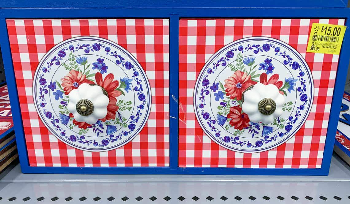the pioneer woman 2-drawer gingham dresser on walmart shelf with clearance tag