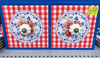 the pioneer woman 2-drawer gingham dresser on walmart shelf with clearance tag