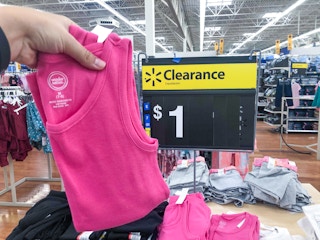 pink wonder nation girl tough tank top held up in front of $1 clearance sign