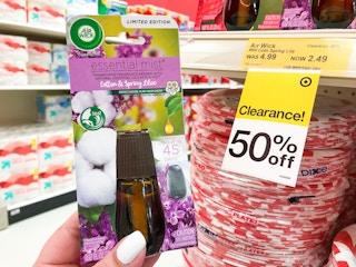 hand holding air wick essential mist refill clearance at target