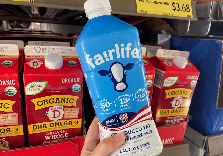 a person holding up fairlife milk