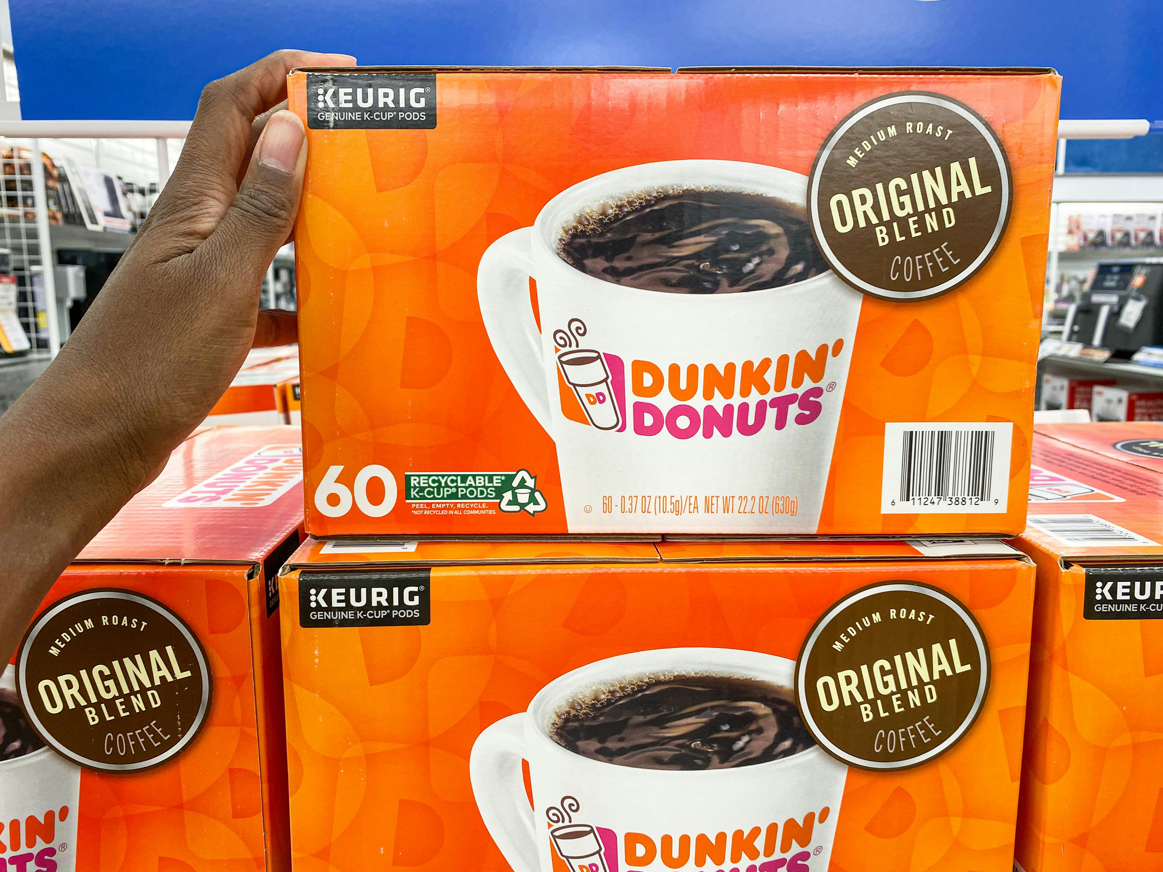 a box of Keurig dunking donuts k-cups on top of another box in bed bath and beyond