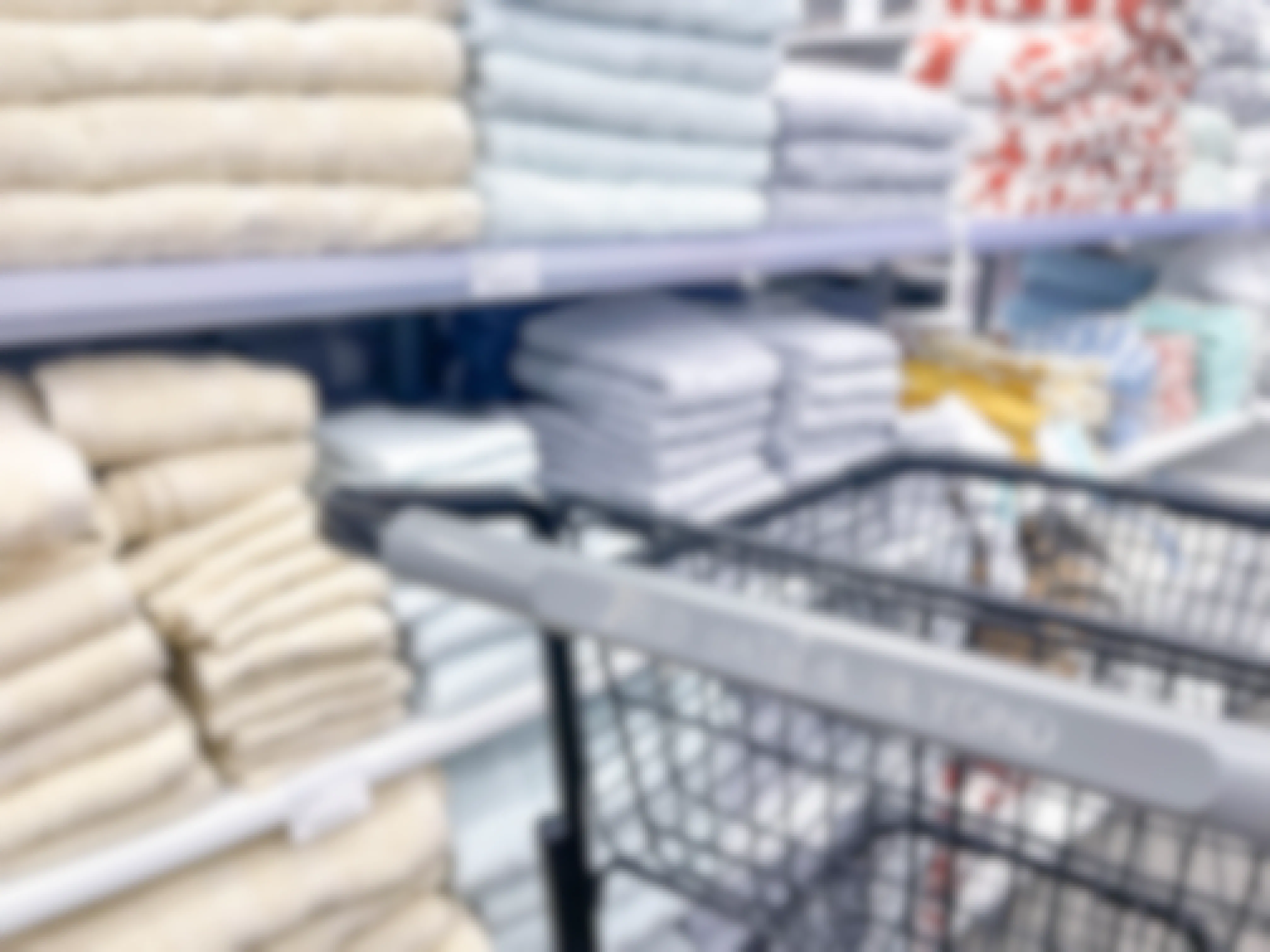 bed bath and beyond towels near cart in store