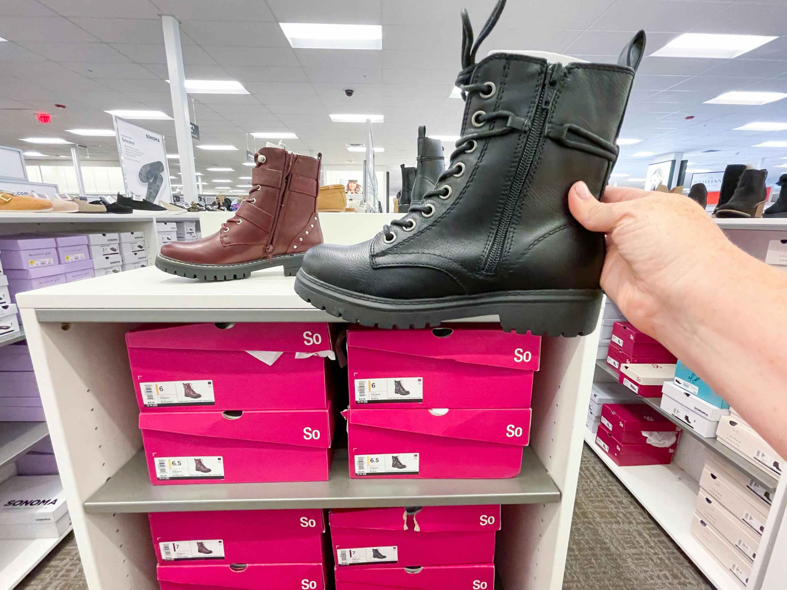 boots and shoe boxes in store