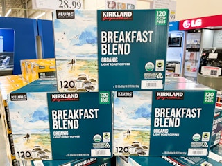 Kirkland brand Breakfast blend organic coffee k cups stacked in a pile of 3 at Costco.