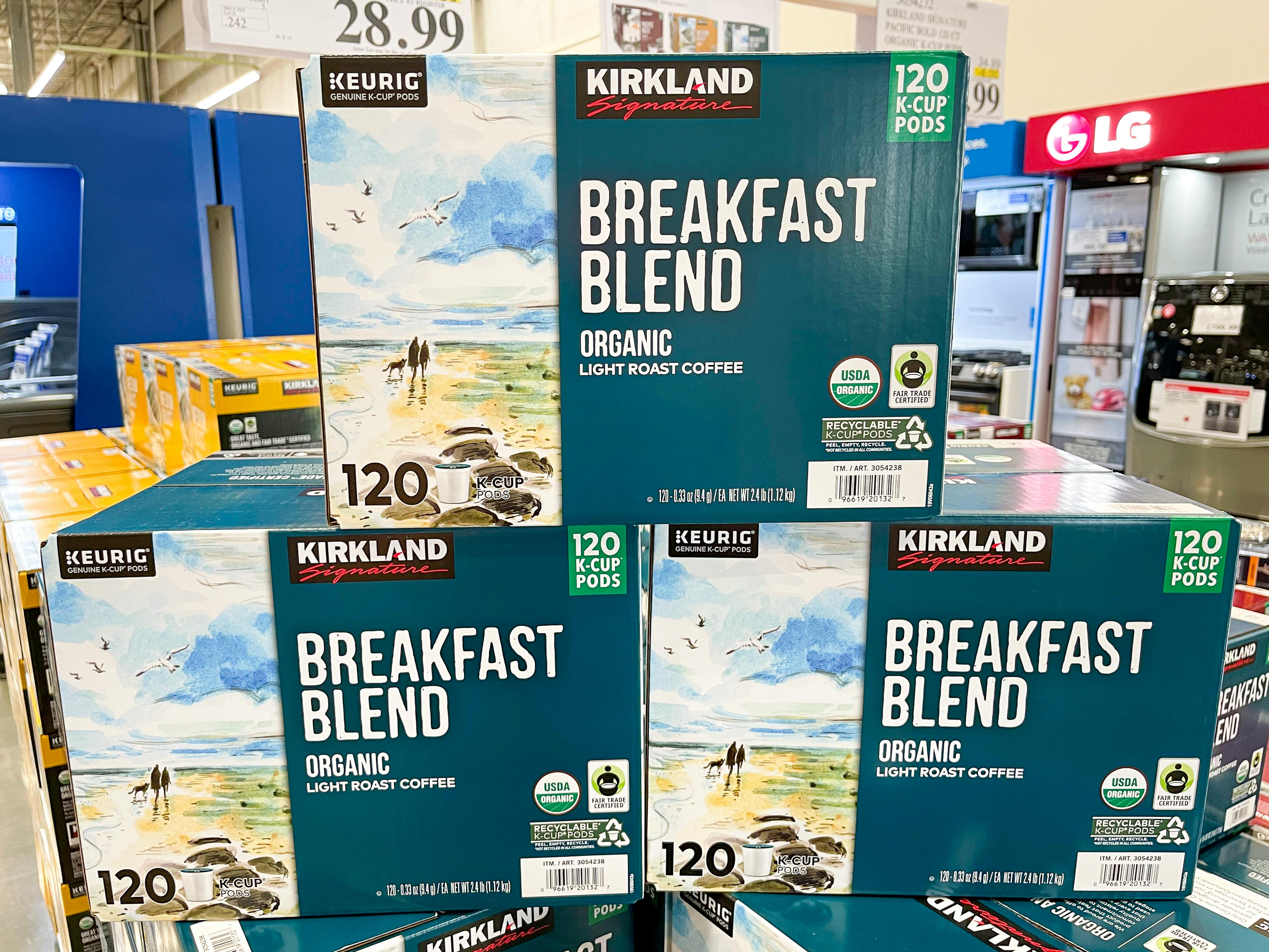 Kirkland brand Breakfast blend organic coffee k cups stacked in a pile of 3 at Costco.