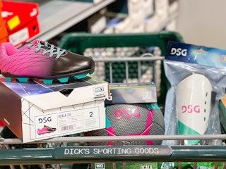 Girls soccer gear in a dicks sporting goods shopping basket