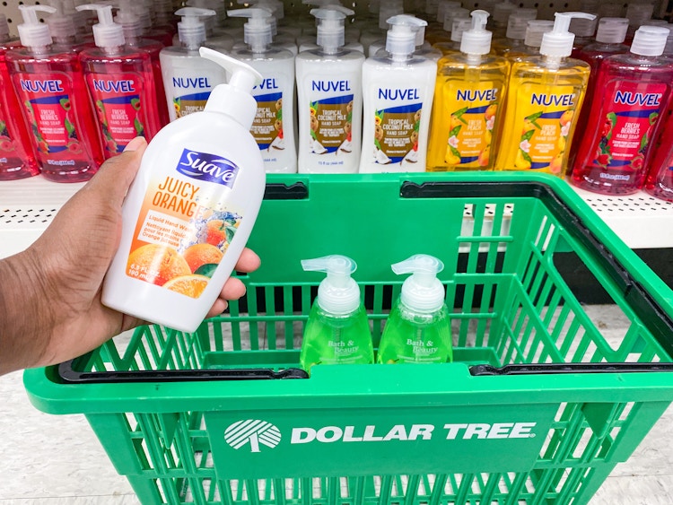 a bottle of hand soap being placed in a dollar tree basket with other hand soaps in the hand soap section in dollar tree 