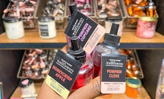 hand holding wallflowers fragrance refills