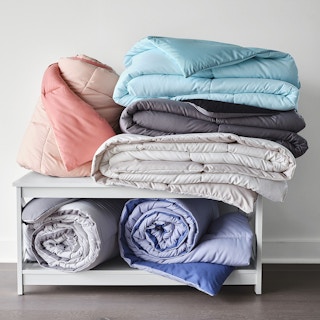 comforters folded in a pile