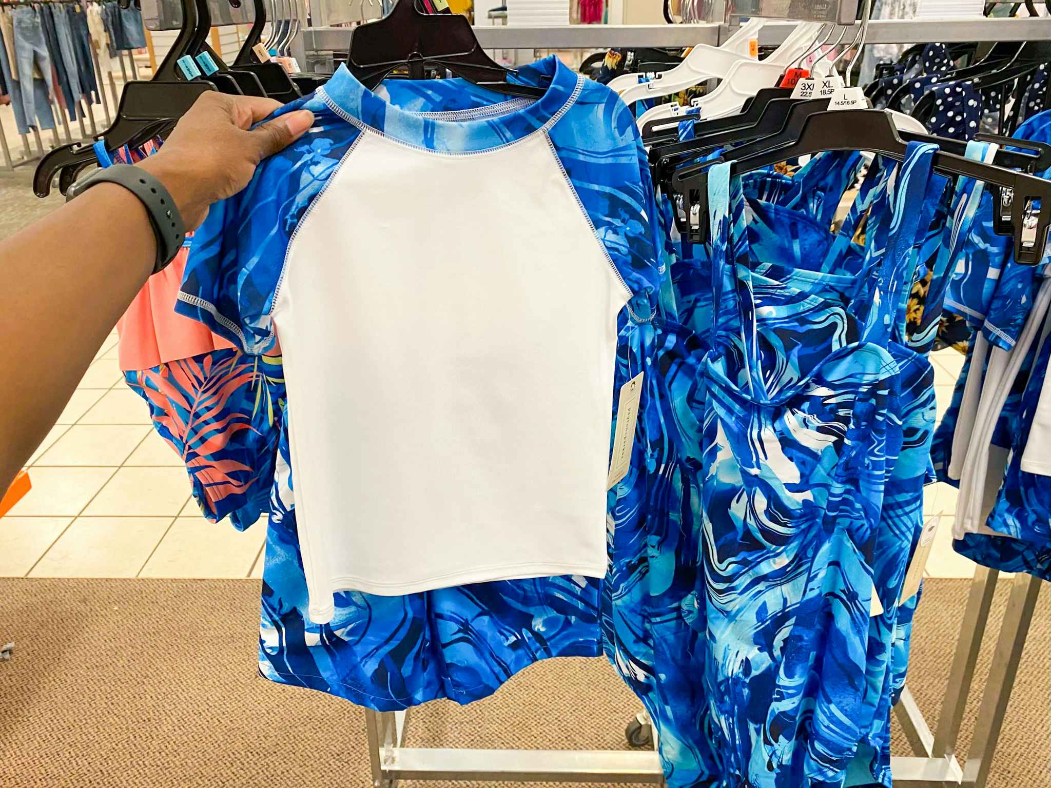 hand holding boys' rashguard swim set