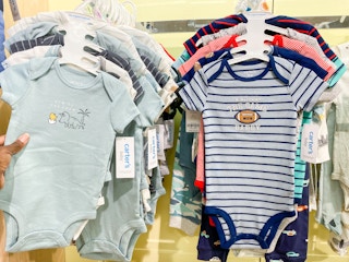 two racks full of carters bodysuits multipacks side by side in kohls