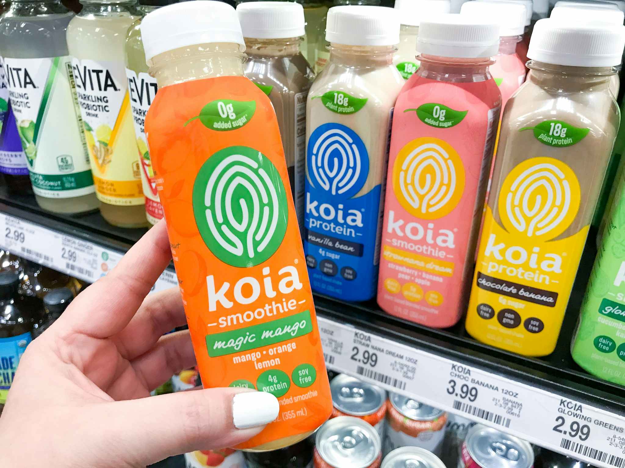 hand holding koia smoothie at target