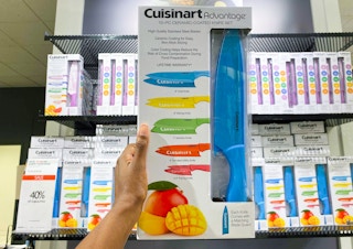 hand holding knife set