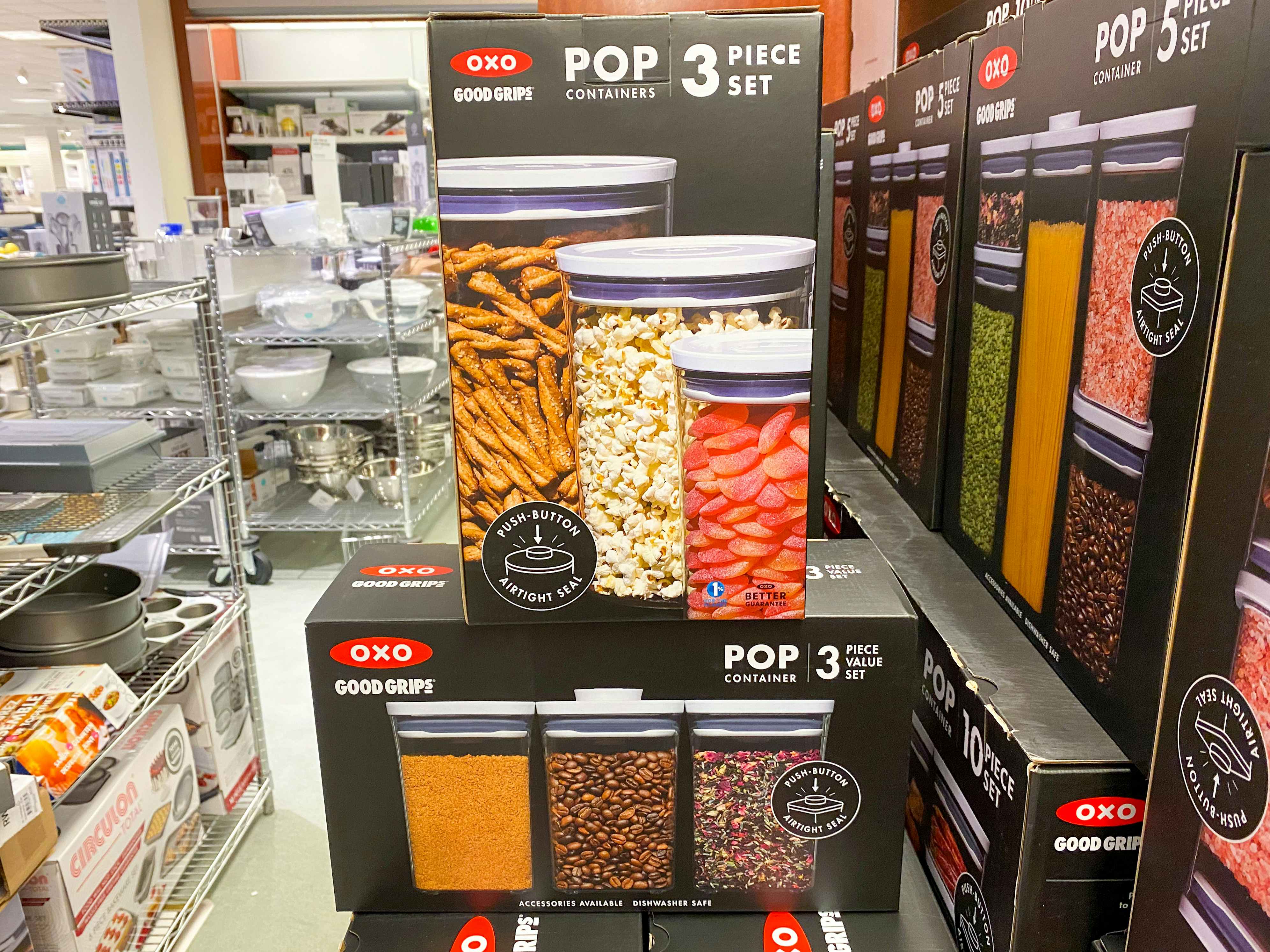 a display of oxo food storage containers stacked on top of each in macys