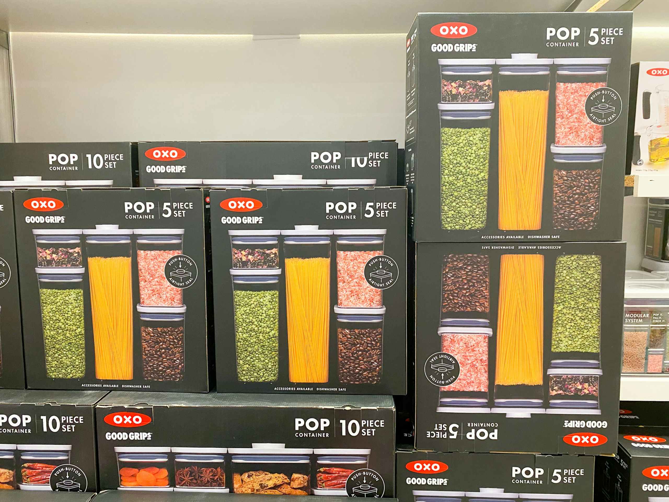 a display of oxo food storage containers stacked on top of each in macys