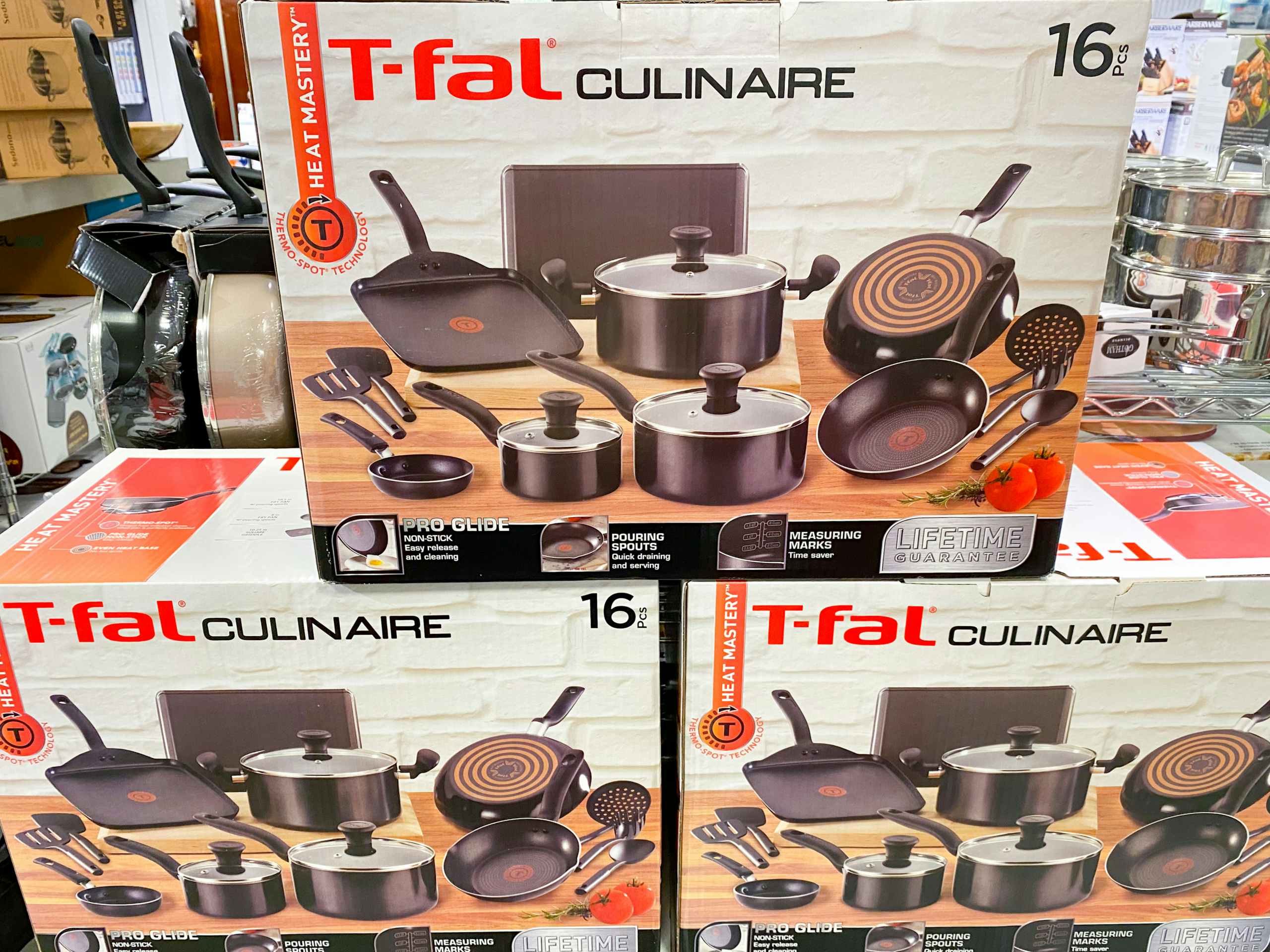 t-fal cookware sets stacked on top of each other in macys