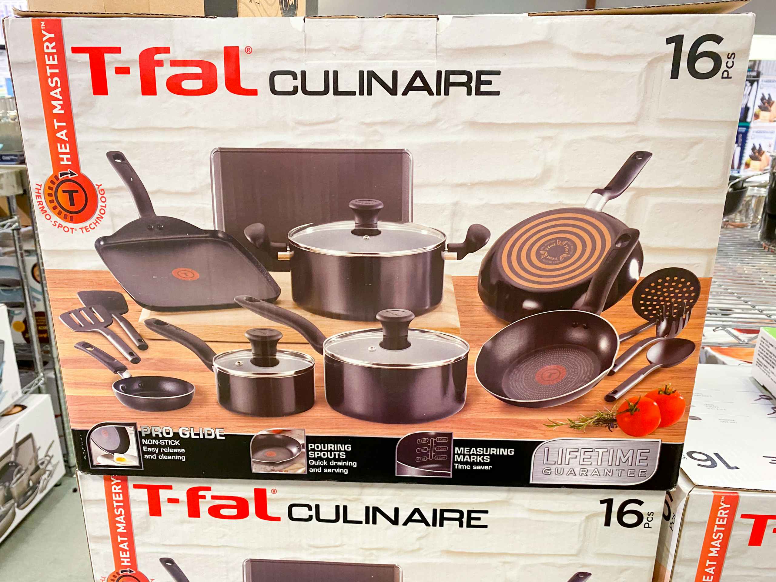 t-fal cookware sets stacked on top of each other in macys