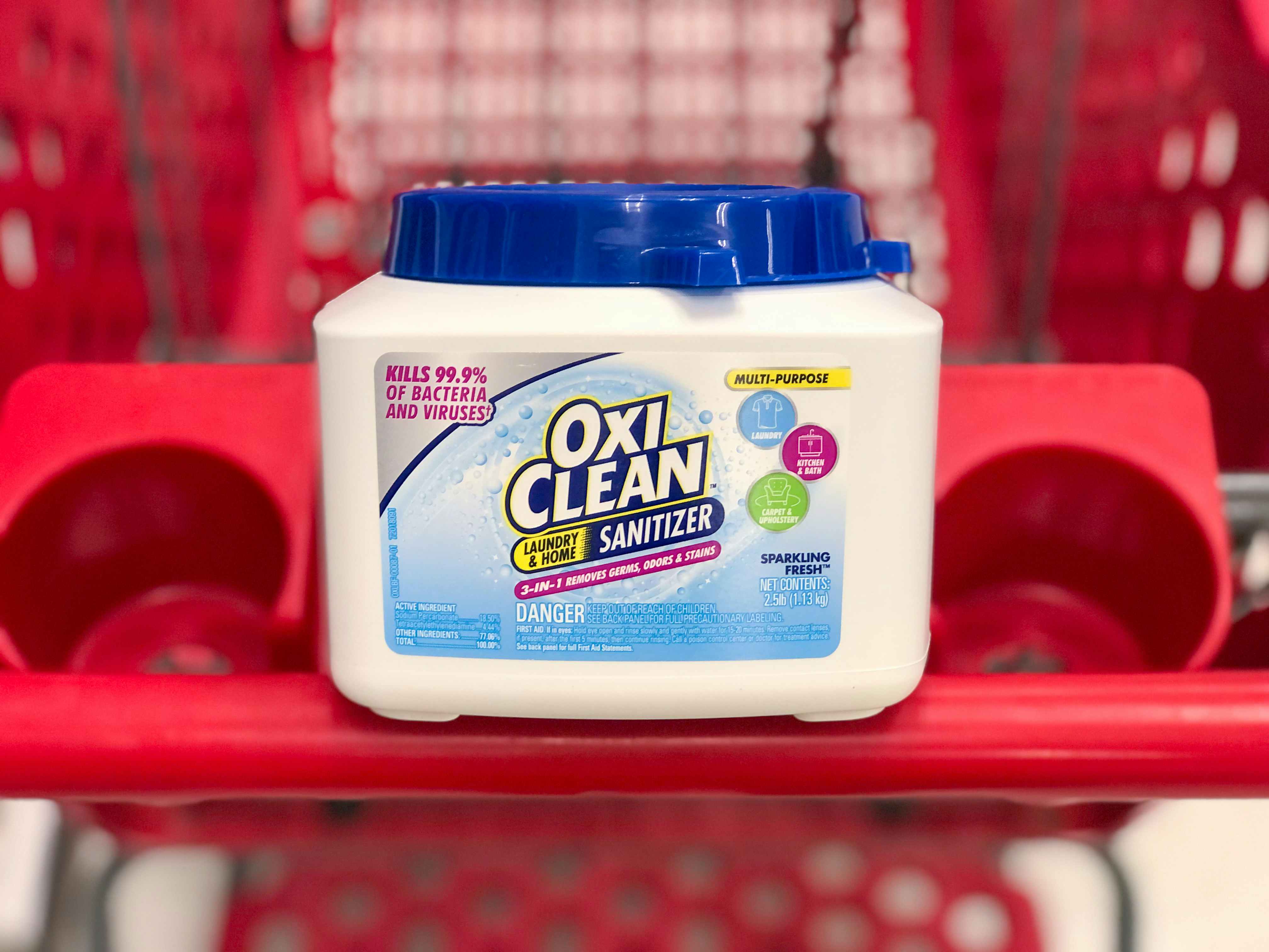 tub of Oxi Clean sanitizer in Target shopping cart