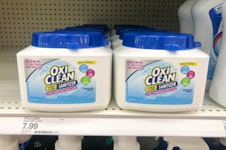 tubs of Oxi Clean sanitizer on store shelf
