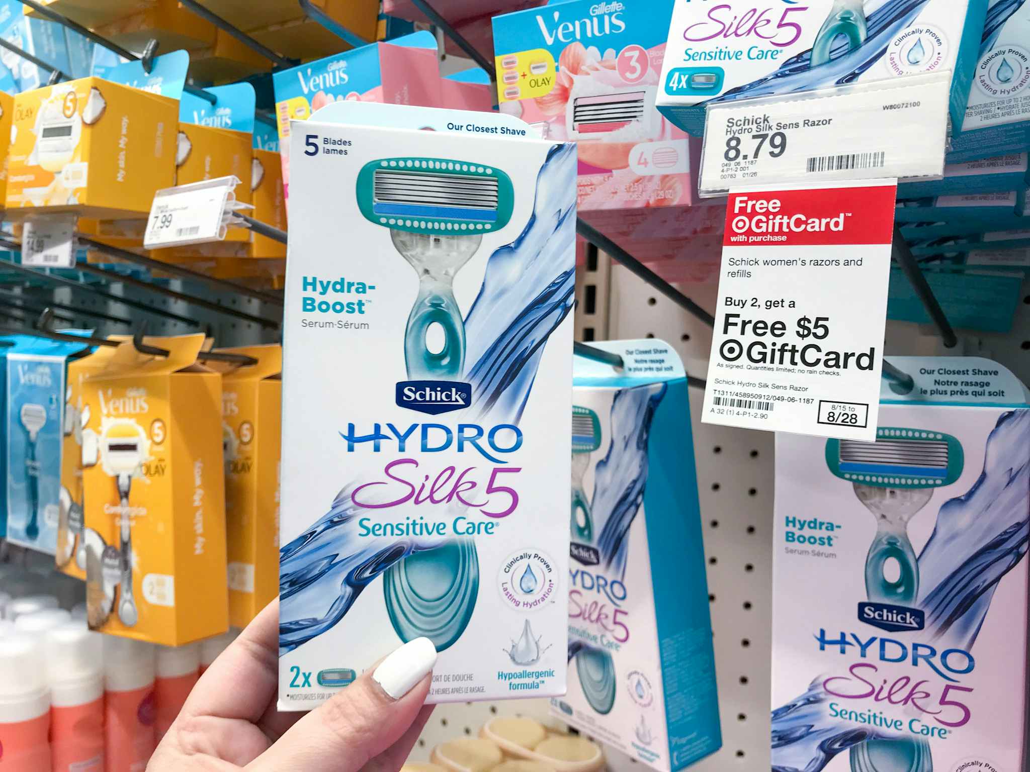 hand holding a schick hydro 5 razor at target