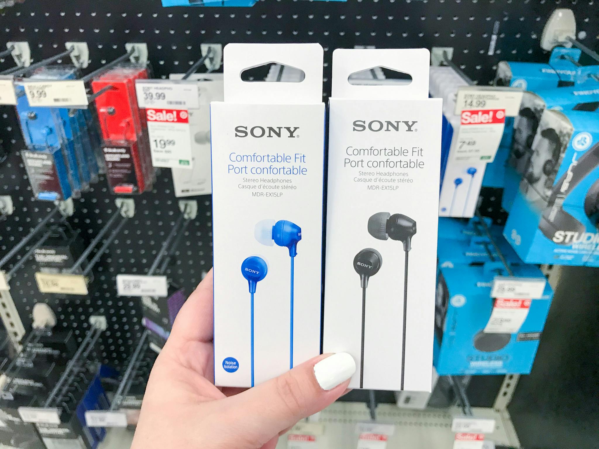 hand holding sony headphones at target