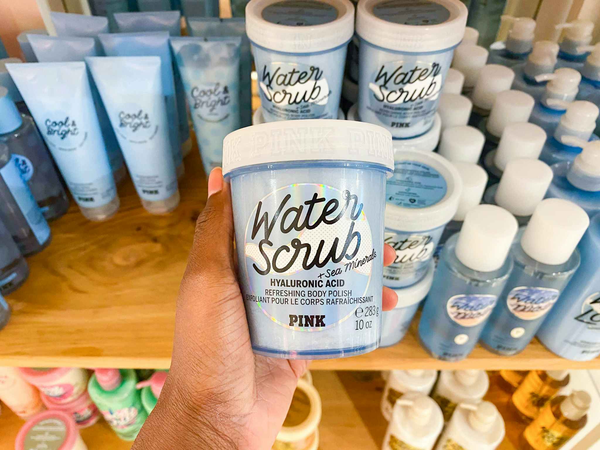 hand holding body care item